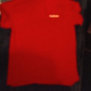 A red short sleeve shirt